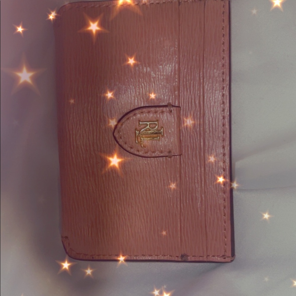 Tommy Hilfiger card holder dont need it have a bunch